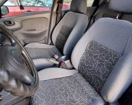 Красный Дэу Ланос, объемом двигателя 1.5 л и пробегом 139 тыс. км за 2400 $, фото 4 на Automoto.ua