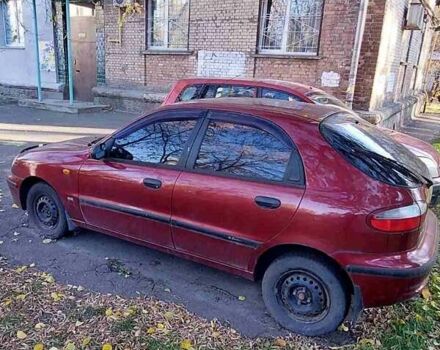 Красный Дэу Ланос, объемом двигателя 1.5 л и пробегом 139 тыс. км за 2400 $, фото 2 на Automoto.ua