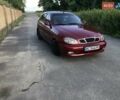 Красный Дэу Ланос, объемом двигателя 1.5 л и пробегом 230 тыс. км за 2100 $, фото 1 на Automoto.ua