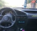 Красный Дэу Ланос, объемом двигателя 1.5 л и пробегом 230 тыс. км за 2100 $, фото 5 на Automoto.ua