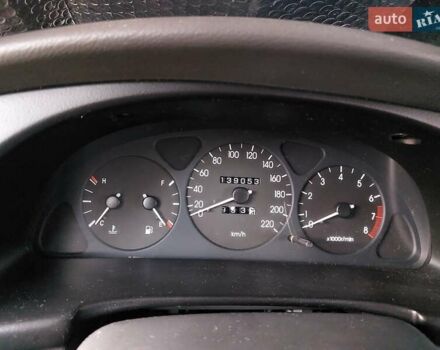 Красный Дэу Ланос, объемом двигателя 1.5 л и пробегом 139 тыс. км за 2400 $, фото 3 на Automoto.ua