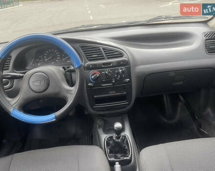 Красный Дэу Ланос, объемом двигателя 1.5 л и пробегом 194 тыс. км за 2300 $, фото 13 на Automoto.ua