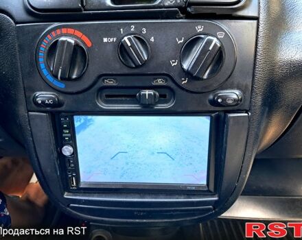 Красный Дэу Ланос, объемом двигателя 1.5 л и пробегом 170 тыс. км за 1600 $, фото 2 на Automoto.ua