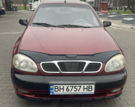 Красный Дэу Ланос, объемом двигателя 1.5 л и пробегом 194 тыс. км за 2300 $, фото 1 на Automoto.ua