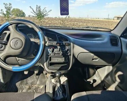 Красный Дэу Ланос, объемом двигателя 1.5 л и пробегом 183 тыс. км за 3200 $, фото 13 на Automoto.ua