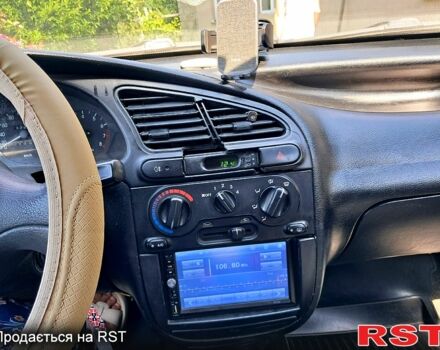 Красный Дэу Ланос, объемом двигателя 1.5 л и пробегом 170 тыс. км за 1600 $, фото 3 на Automoto.ua