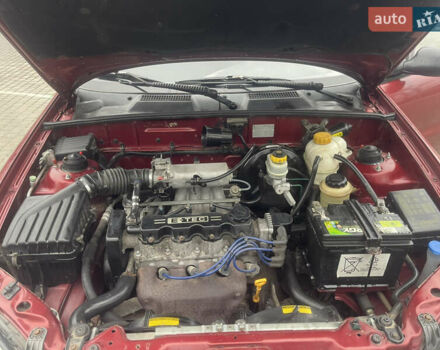 Красный Дэу Ланос, объемом двигателя 1.5 л и пробегом 194 тыс. км за 2300 $, фото 17 на Automoto.ua