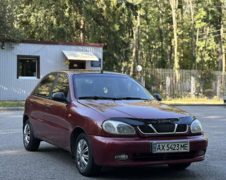 Красный Дэу Ланос, объемом двигателя 1.5 л и пробегом 290 тыс. км за 1950 $, фото 3 на Automoto.ua