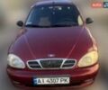 Красный Дэу Ланос, объемом двигателя 1.5 л и пробегом 200 тыс. км за 1000 $, фото 1 на Automoto.ua