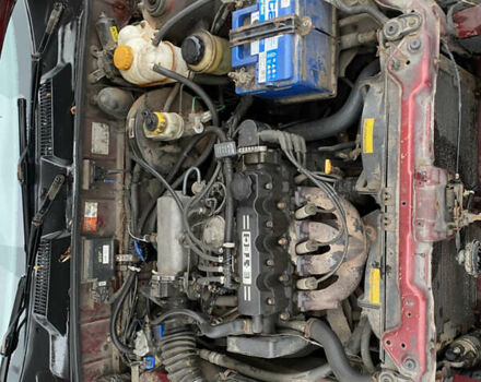 Красный Дэу Ланос, объемом двигателя 1.5 л и пробегом 350 тыс. км за 1399 $, фото 8 на Automoto.ua