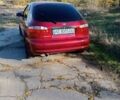 Дэу Ланос 2006 в Никополе на Automoto.ua Красный Дэу Ланос, объемом двигателя 0 л и пробегом 206 тыс. км за 2650 $, фото 30 на Automoto.ua