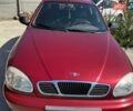 Красный Дэу Ланос, объемом двигателя 1.5 л и пробегом 225 тыс. км за 2300 $, фото 2 на Automoto.ua
