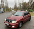 Красный Дэу Ланос, объемом двигателя 1.5 л и пробегом 350 тыс. км за 1399 $, фото 1 на Automoto.ua
