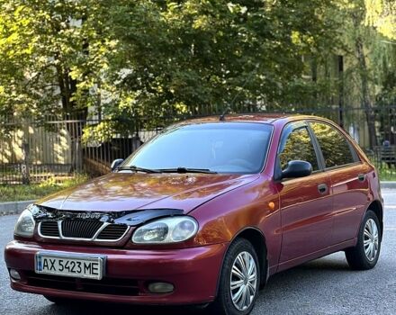 Красный Дэу Ланос, объемом двигателя 1.5 л и пробегом 290 тыс. км за 1950 $, фото 4 на Automoto.ua
