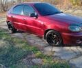 Дэу Ланос 2006 в Никополе на Automoto.ua Красный Дэу Ланос, объемом двигателя 0 л и пробегом 206 тыс. км за 2650 $, фото 1 на Automoto.ua
