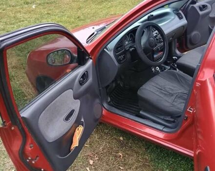 Дэу Ланос 2008 в Сумах на Automoto.ua Красный Дэу Ланос, объемом двигателя 1.5 л и пробегом 240 тыс. км за 3000 $, фото 9 на Automoto.ua