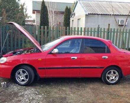 Красный Дэу Ланос, объемом двигателя 1.5 л и пробегом 320 тыс. км за 2100 $, фото 5 на Automoto.ua