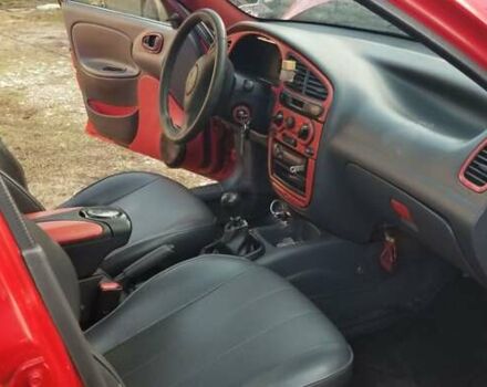 Красный Дэу Ланос, объемом двигателя 1.5 л и пробегом 320 тыс. км за 2100 $, фото 10 на Automoto.ua