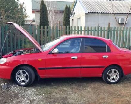 Красный Дэу Ланос, объемом двигателя 1.5 л и пробегом 320 тыс. км за 2100 $, фото 4 на Automoto.ua