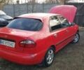 Красный Дэу Ланос, объемом двигателя 1.5 л и пробегом 320 тыс. км за 2100 $, фото 3 на Automoto.ua