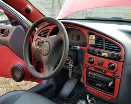 Красный Дэу Ланос, объемом двигателя 1.5 л и пробегом 320 тыс. км за 2100 $, фото 11 на Automoto.ua
