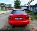 Красный Дэу Ланос, объемом двигателя 1.5 л и пробегом 172 тыс. км за 2000 $, фото 1 на Automoto.ua