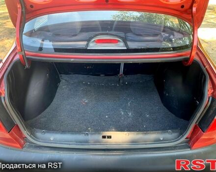 Красный Дэу Ланос, объемом двигателя 1.5 л и пробегом 93 тыс. км за 2500 $, фото 8 на Automoto.ua