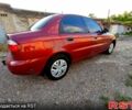 Красный Дэу Ланос, объемом двигателя 1.5 л и пробегом 194 тыс. км за 2200 $, фото 5 на Automoto.ua