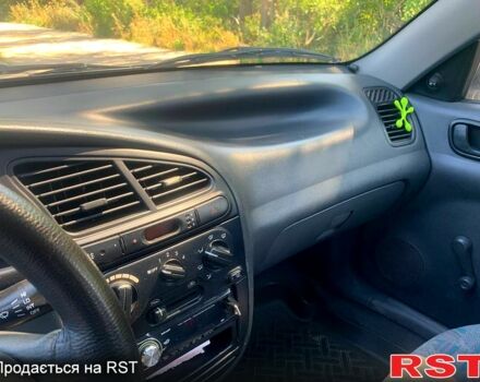 Красный Дэу Ланос, объемом двигателя 1.5 л и пробегом 93 тыс. км за 2500 $, фото 5 на Automoto.ua