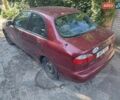 Красный Дэу Ланос, объемом двигателя 1.5 л и пробегом 189 тыс. км за 2300 $, фото 1 на Automoto.ua