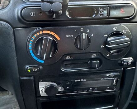 Красный Дэу Ланос, объемом двигателя 1.5 л и пробегом 300 тыс. км за 2650 $, фото 8 на Automoto.ua