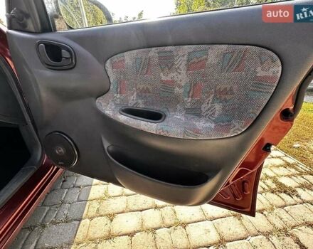 Красный Дэу Ланос, объемом двигателя 1.5 л и пробегом 326 тыс. км за 3100 $, фото 21 на Automoto.ua