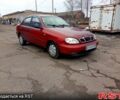 Красный Дэу Ланос, объемом двигателя 1.5 л и пробегом 303 тыс. км за 1550 $, фото 1 на Automoto.ua