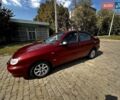 Красный Дэу Ланос, объемом двигателя 1.5 л и пробегом 326 тыс. км за 3100 $, фото 1 на Automoto.ua