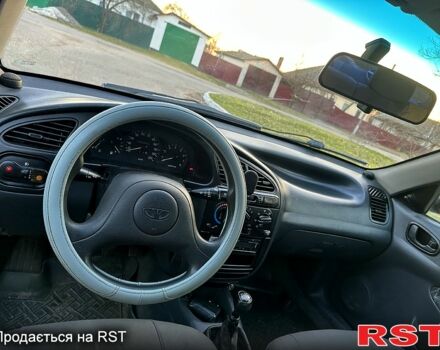 Красный Дэу Ланос, объемом двигателя 1.5 л и пробегом 300 тыс. км за 2650 $, фото 7 на Automoto.ua