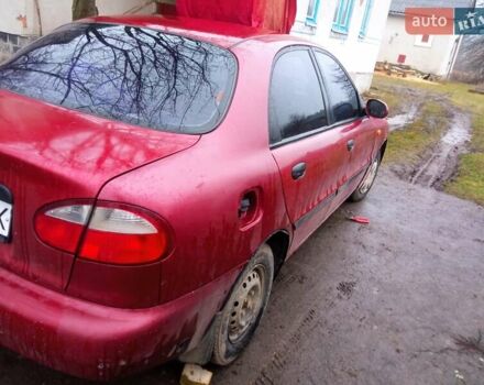 Красный Дэу Ланос, объемом двигателя 1.3 л и пробегом 226 тыс. км за 1500 $, фото 3 на Automoto.ua