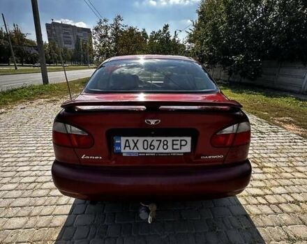 Красный Дэу Ланос, объемом двигателя 1.5 л и пробегом 326 тыс. км за 3100 $, фото 3 на Automoto.ua