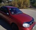 Червоний Деу Ланос, об'ємом двигуна 1.5 л та пробігом 279 тис. км за 1350 $, фото 1 на Automoto.ua