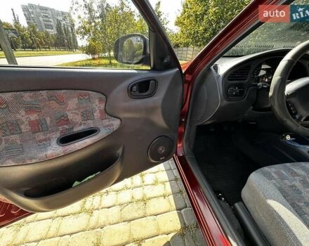 Красный Дэу Ланос, объемом двигателя 1.5 л и пробегом 326 тыс. км за 3100 $, фото 17 на Automoto.ua