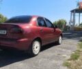 Красный Дэу Ланос, объемом двигателя 1.5 л и пробегом 190 тыс. км за 2500 $, фото 4 на Automoto.ua