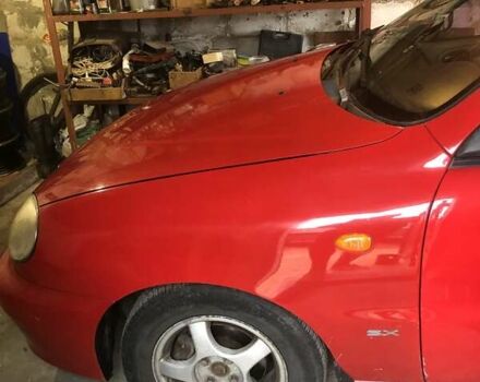 Красный Дэу Ланос, объемом двигателя 1.6 л и пробегом 251 тыс. км за 2300 $, фото 5 на Automoto.ua