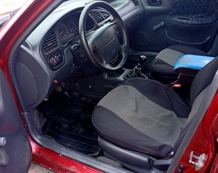 Червоний Деу Ланос, об'ємом двигуна 1.5 л та пробігом 303 тис. км за 1550 $, фото 9 на Automoto.ua