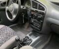Красный Дэу Ланос, объемом двигателя 1.5 л и пробегом 152 тыс. км за 4000 $, фото 3 на Automoto.ua
