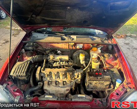 Червоний Деу Ланос, об'ємом двигуна 1.5 л та пробігом 300 тис. км за 1350 $, фото 7 на Automoto.ua