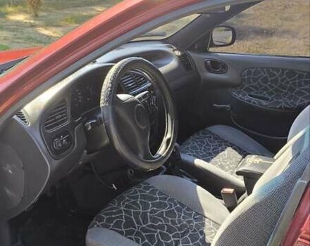 Красный Дэу Ланос, объемом двигателя 1.5 л и пробегом 190 тыс. км за 2500 $, фото 8 на Automoto.ua