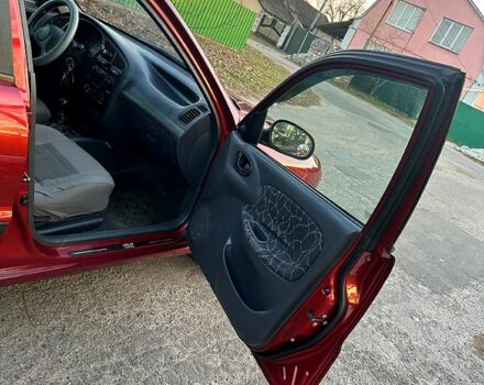 Красный Дэу Ланос, объемом двигателя 1.5 л и пробегом 300 тыс. км за 2650 $, фото 10 на Automoto.ua