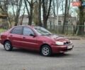 Червоний Деу Ланос, об'ємом двигуна 1.5 л та пробігом 313 тис. км за 2250 $, фото 1 на Automoto.ua
