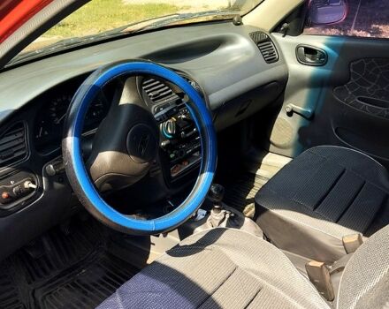 Красный Дэу Ланос, объемом двигателя 1.3 л и пробегом 170 тыс. км за 1800 $, фото 3 на Automoto.ua