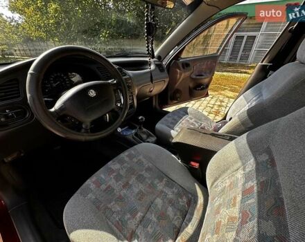 Красный Дэу Ланос, объемом двигателя 1.5 л и пробегом 326 тыс. км за 3100 $, фото 16 на Automoto.ua