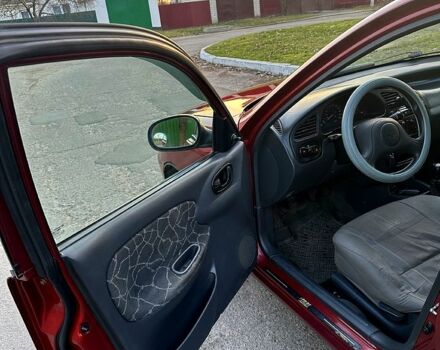 Красный Дэу Ланос, объемом двигателя 1.5 л и пробегом 300 тыс. км за 2650 $, фото 6 на Automoto.ua